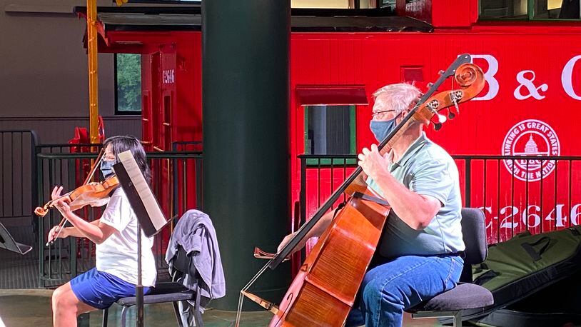 Violinist Ann Lin Baer and Bassist John Pascolini rehearse at the James F. Dicke Family Transportation Center for the upcoming DPAA concert A Celebration from Carillon Historical Park. CONTRIBUTED