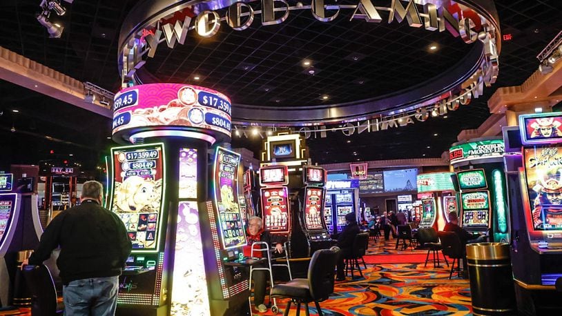 Gamblers, foodies and goodtime seekers walk the aisles at Hollywood Gaming at Dayton Raceway Friday afternoon January 13, 2023. JIM NOELKER/STAFF