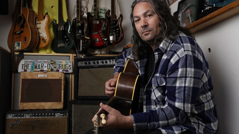 Adam Granduciel, leader of the band The War on Drugs, poses for a portrait at his studio on Monday, Aug. 26, 2024, in Burbank, Calif. (AP Photo/Chris Pizzello)