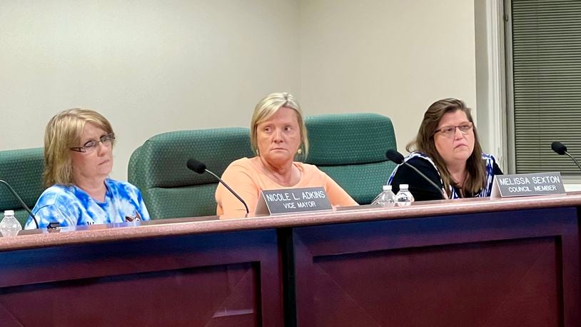 New Lebanon Village Vice Mayor Nicole Adkins, left, along with council members Melissa Sexton, center, and Tammy Loch during the May 7, 2024, regular meeting. AIMEE HANCOCK/STAFF