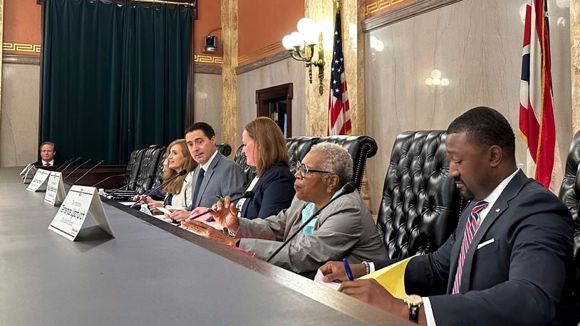 FILE - Members of the Ohio Ballot Board convene at the Ohio Statehouse in Columbus, Ohio, Aug. 16, 2024, to consider language for a fall redistricting amendment. (AP Photo/Julie Carr Smyth, File)