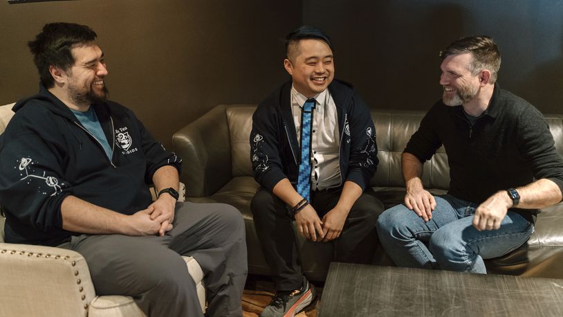 Jam & Tea Studios founders, left to right, Michael Yichao, Carl Kwoh, and J. Aaron Farr sit for photos on Jan. 18, 2024, in Roslyn, Wash. (Lutisha Aubrey Photography via AP)