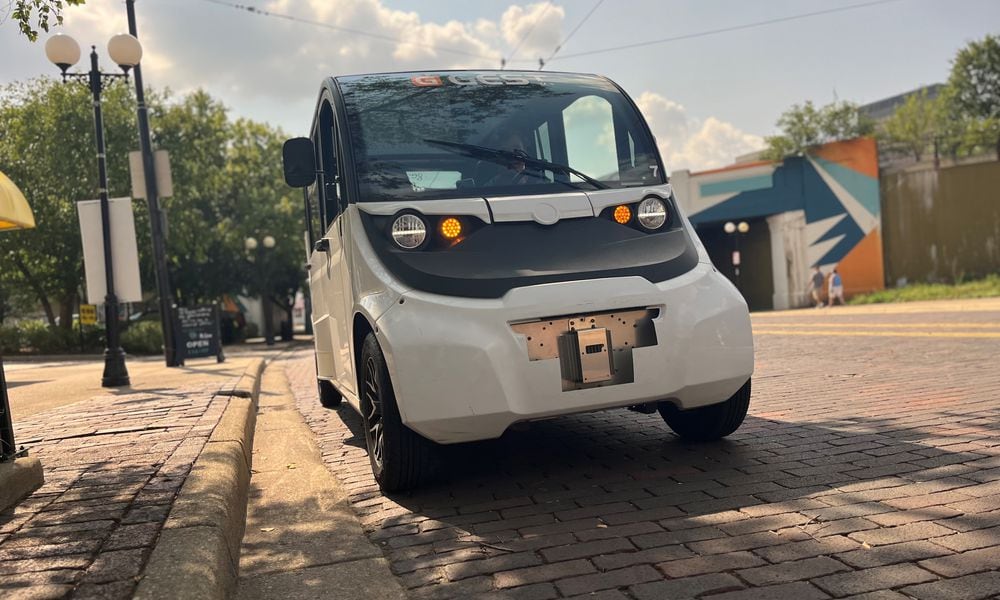 GEST Dayton, a new electric cart ride service, offered free rides in downtown Dayton during Art in the City on Saturday, Aug. 3, 2024. CORNELIUS FROLIK / STAFF