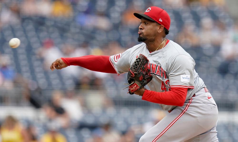 Cincinnati Reds relief pitcher Alexis Diaz delivers during the ninth inning of a baseball game against the Pittsburgh Pirates Sunday, Aug. 25, 2024, in Pittsburgh. (AP Photo/Matt Freed)