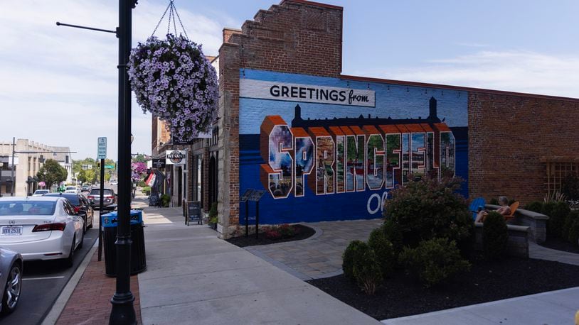 
                        A mural in downtown Springfield, Ohio, Aug. 27, 2024. Though rumors of immigrants “eating pets” have been debunked, they are meme-able — and that has given it a life far beyond the right-wing internet. (Maddie McGarvey/The New York Times)
                      