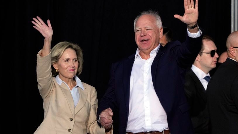 Democratic vice presidential nominee Minnesota Gov. Tim Walz and his wife Gwen arrive for a campaign stop at Laborfest Monday, Sept. 2, 2024, in Milwaukee. (AP Photo/Morry Gash)