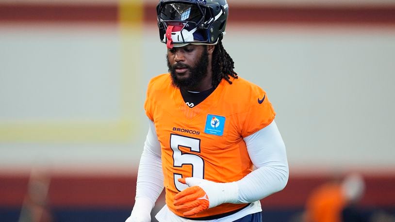 Denver Broncos linebacker Baron Browning heads over to take part in a drill during an NFL football practice Friday, Sept. 6, 2024, at the team's headquarters in Centennial, Colo. (AP Photo/David Zalubowski)