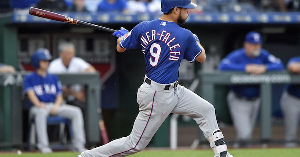 Texas Rangers' Adrian Beltre follows through on a double to right