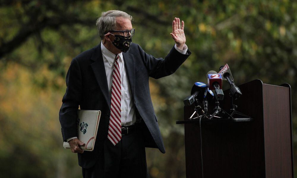 Ohio Gov. Mike DeWine visited Dayton's Patterson Homestead Friday, Oct. 9, 2020, where he gave an impromptu press conference urging greater mask usage. Ohio set a daily record Friday of more than 1,800 COVID-19 cases. JIM NOELKER/STAFF