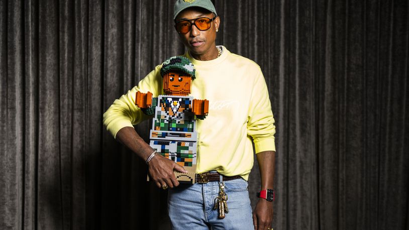 Pharrell Williams poses for a portrait to promote the film "Piece by Piece" during the Toronto International Film Festival, Monday, Sept. 9, 2024, in Toronto. (Photo by Arthur Mola/Invision/AP)