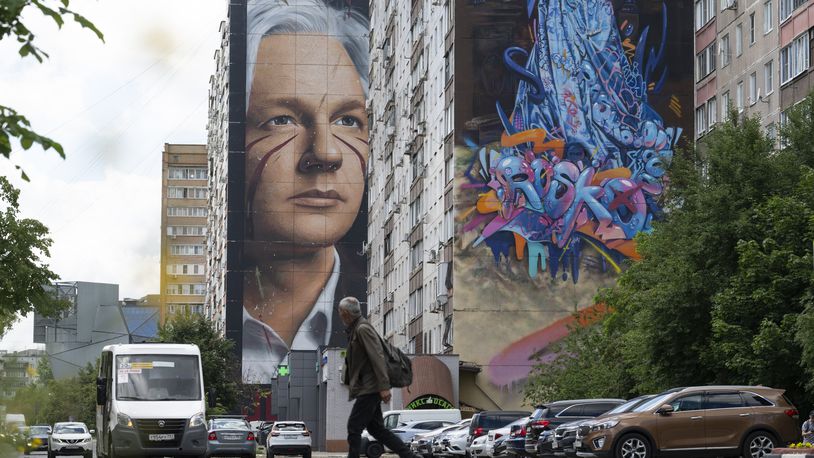 A mural showing WikiLeaks founder Julian Assange is seen on the wall of an apartment building in a street of the town of Balashikha outside Moscow, Russia, Wednesday, June 26, 2024. Assange has returned to his homeland Australia aboard a charter jet hours after pleading guilty to obtaining and publishing U.S. military secrets in a deal with Justice Department prosecutors that concludes a drawn-out legal saga. (AP Photo/Dmitry Serebryakov)