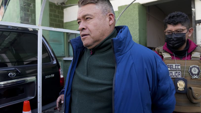 Juan Jose Zuniga, former commanding general of the army, is escorted from a jail to be taken to Chonchocoro maximum security prison, in La Paz, Bolivia, Saturday, June 29, 2024. Zuniga was detained for his involvement in what President Luis Arce called a coup attempt. (AP Photo/Juan Karita)
