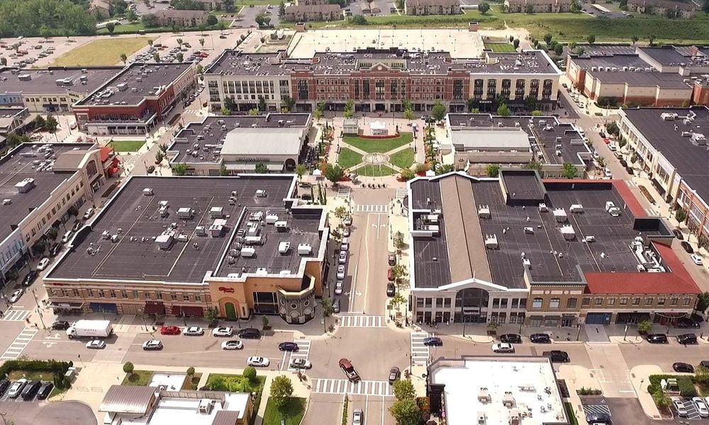 The Greene Town Center in Beavercreek opened in 2006 and is now boasting more than 100 shops and restaurants in the mixed retail open shopping center. TY GREENLEES / STAFF