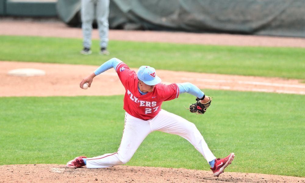 Dayton's Nick Wissman pitches against Davidson in a game in 2024. Photo by Erik Schelkun