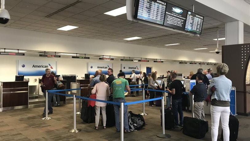 Passengers line up at Dayton International in busier days.