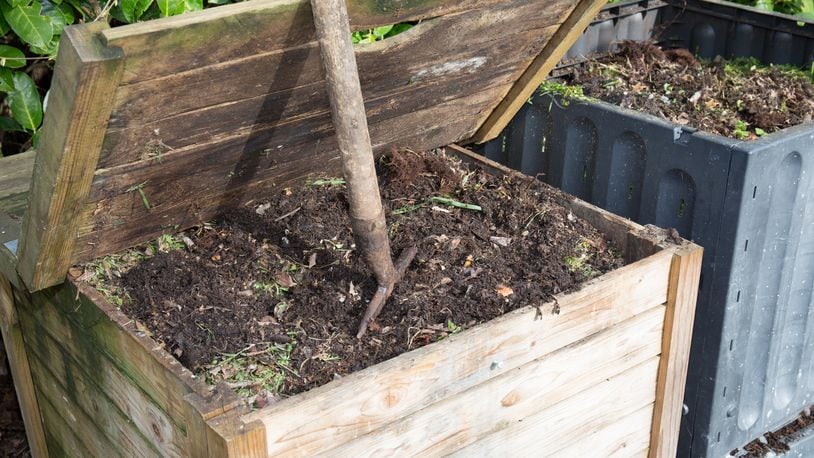 Whether you have a spacious garden and several trees and shrubs or a tiny plot, you can benefit from a compost bin. iSTOCK?COX