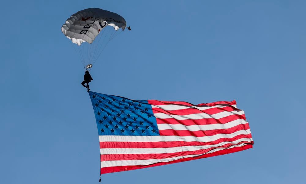 The Ohio Challenge Hot Air Balloon and Skydiving Festival kicked off the weekend event Friday, July 19, 2024 at Smith Park in Middletown with balloon launch and glow, flag and pyrotechnics jumps by Team Fastrax, fireworks show by Yokum Fireworks, a drone show and more. NICK GRAHAM/STAFF