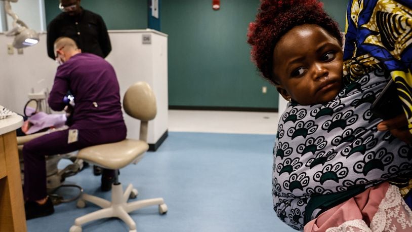 Refugee children from the Congo are provided dental care by Sinclair Community College dental hygiene students at the Sinclair Community College Midmark Dental Health Clinic on Monday, June 3, 2024. JIM NOELKER/STAFF