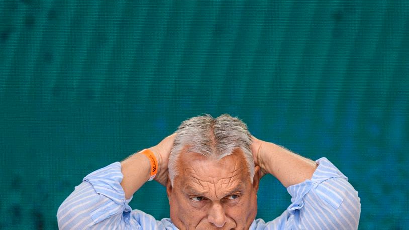 FILE - Hungarian Prime Minister Viktor Orban waits to deliver a speech at Tusvanyos Summer University, in Baile Tusnad, Harghita county, Romania, July 27, 2024. (AP Photo/Alexandru Dobre)