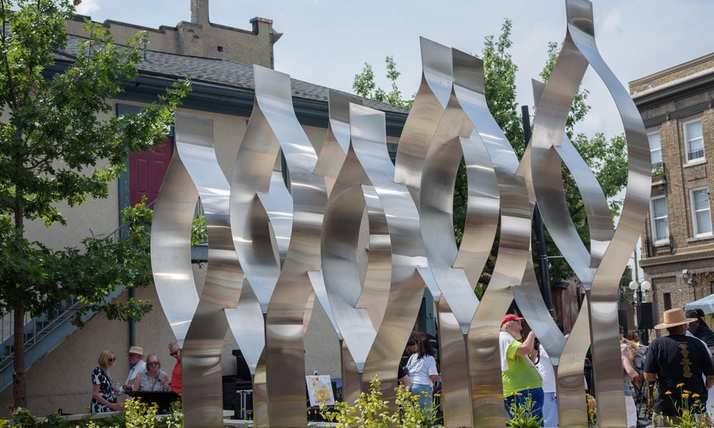 The Seed of Life Memorial, located at 530 E. Fifth St. in Dayton was unveiled on Aug. 4, 2024, five years after the mass shooting that left nine people dead and more than two dozen injured in Dayton's Oregon District. TOM GILLIAM / CONTRIBUTING PHOTOGRAPHER