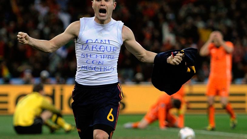 FILE - Spain's Andres Iniesta celebrates after scoring the only goal in the World Cup final soccer match against the Netherlands at Soccer City in Johannesburg, South Africa, July 11, 2010 file photo. (AP Photo/Martin Meissner, File)