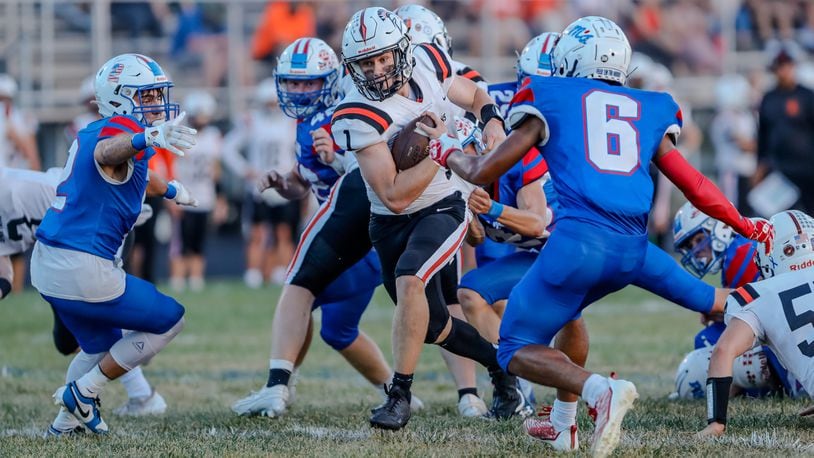 Waynesville High School senior Alex Amburgy runs the ball during their game against Greeneview on Thursday night at Don Nock Field in Jamestown. The Rams won 40-28. Michael Cooper/CONTRIBUTED