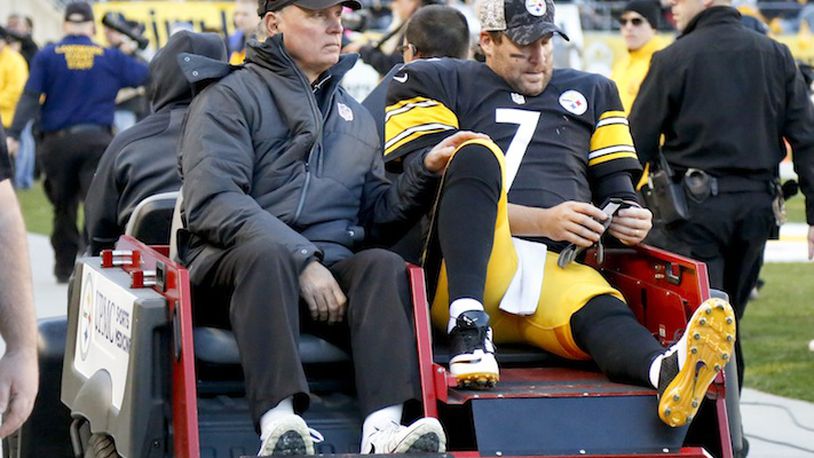 Pittsburgh Steelers quarterback Ben Roethlisberger (7) is taken away on a  cart after being injured in