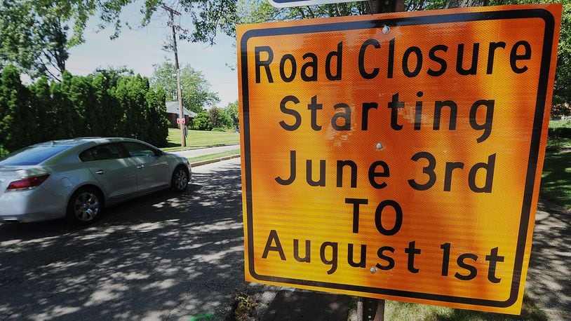 East David Road's westbound lanes from Ackerman Boulevard to Far Hills Avenue in Kettering have been closed since early June. They are expected to reopen this week, a city official said. MARSHALL GORBY\STAFF