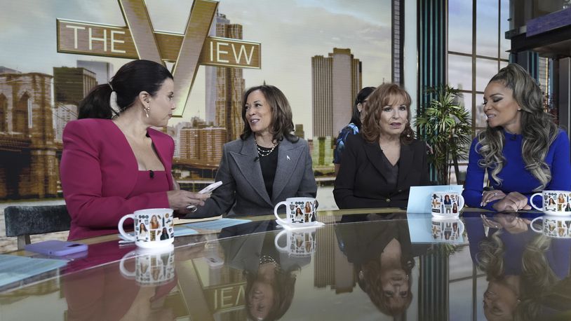 Democratic presidential nominee Vice President Kamala Harris chats with the hosts during a commercial break at The View, Tuesday, Oct. 8, 2024, in New York. (AP Photo/Jacquelyn Martin)