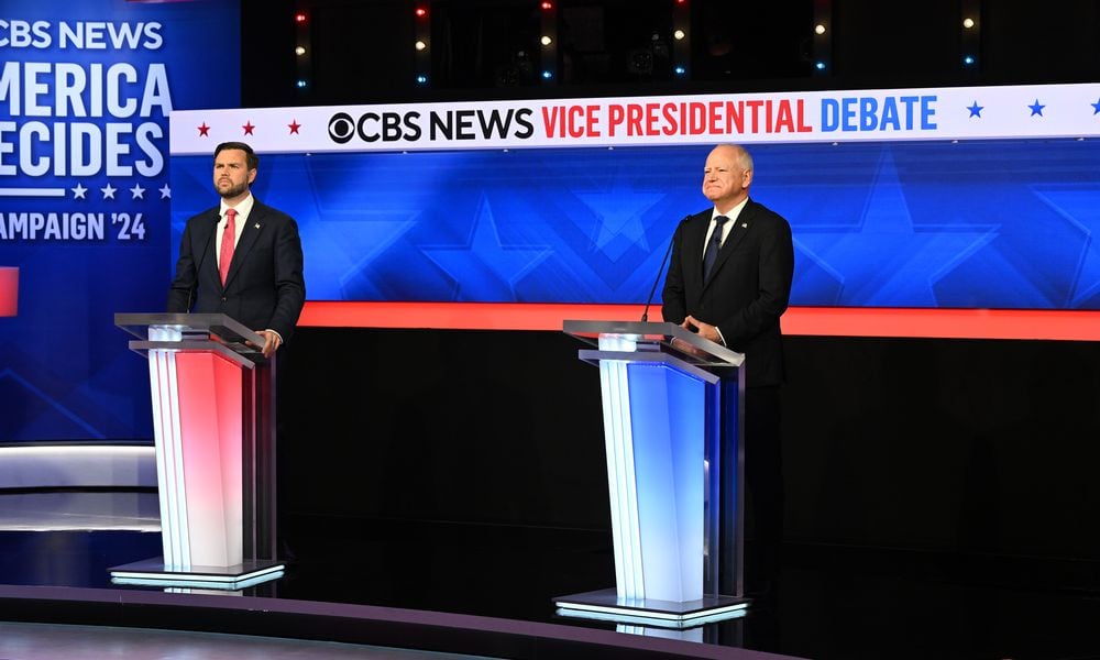  Sen. JD Vance (R-Ohio) and Gov. Tim Walz of Minnesota at the start of the vice-presidential debate at the CBS Broadcast Center in New York on Tuesday, Oct. 1, 2024. (Kenny Holston/The New York Times) 