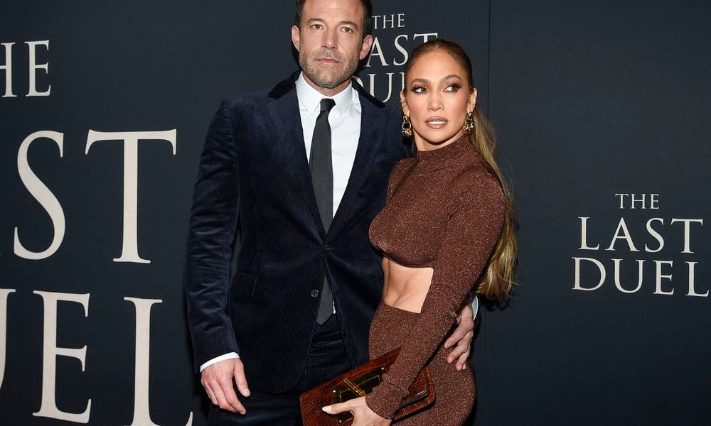 FILE - Actor Ben Affleck, left, and actor-singer Jennifer Lopez attend the premiere of 