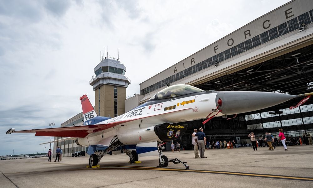 The F-16 Viper Demonstration Teams custom F-16 Fighting Falcon sits on the flightline at Wright-Patterson Air Force Base, Ohio, June 25. The Viper Demo Team were present during an F-16 Golden Anniversary ceremony and put on an aerial demonstration for spectators later that day. (U.S. Air Force photo by Daniel Peterson)