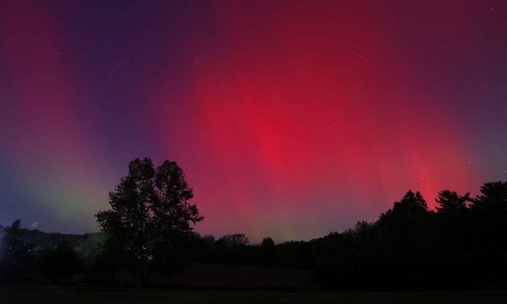 The Aurora Borealis, or northern lights, was visible from Ohio Thursday, Oct. 10, 2024. This was in Madison Township in Butler County. NICK GRAHAM/STAFF