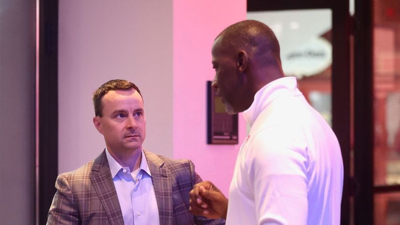 Rhode Island's Archie Miller talks to Dayton's Anthony Grant during Atlantic 10 Conference Media Day on Monday, Oct. 7, 2024, at District E next to Capital One Arena in Washington, D.C. David Jablonski/Staff