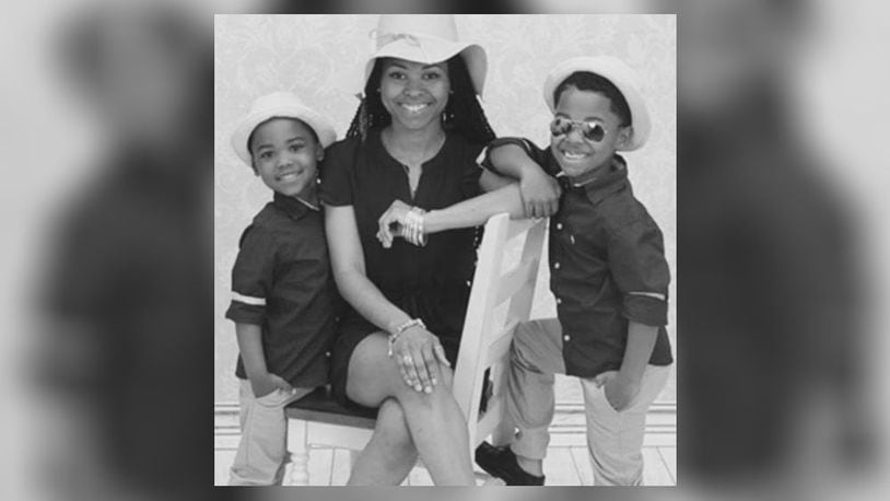 Jasmyne McCutcheon, 31, a Dayton resident, and her two sons.