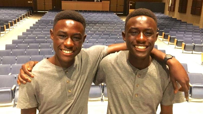 Twins Kelvin and Alvin Mantey moved from the Republic of Ghana in West Africa to Hamilton in 2014. The two are shown in this 2016 file photo Hamilton High School. MICHAEL D. CLARK/STAFF