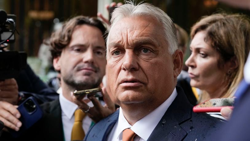 Hungarian Prime Minister Viktor Orban talks to reporters at The European House Ambrosetti (TEHA) economic forum in Cernobbio, Como Lake, Italy, Friday, Sept. 6, 2024. (AP Photo/Luca Bruno)