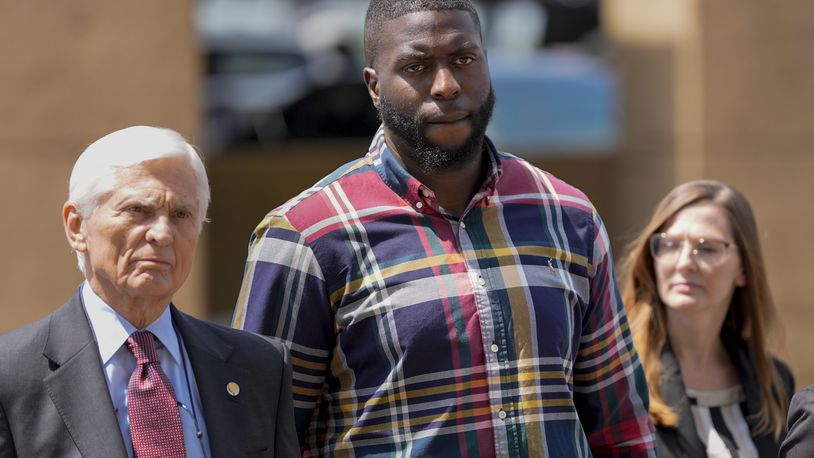 Emmitt Martin III, a former Memphis Police Department officer, second from left, accused of killing Tyre Nichols, walks into federal court Friday, Aug. 23, 2024, in Memphis, Tenn. (AP Photo/George Walker IV)