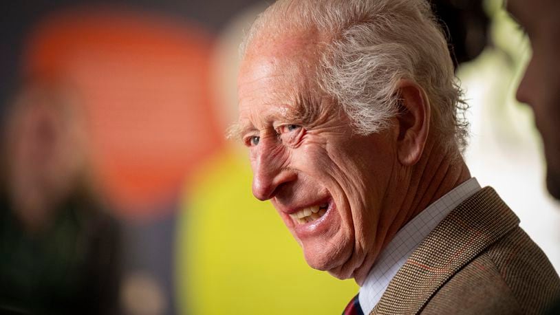 Britain's King Charles III smiles during his visit to the Forsinard Flows Visitor Centre in Forsinard, Highland, Scotland, July 31, 2024. (Jane Barlow/Pool Photo via AP, File)