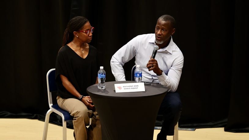 Chris Grant and Dayton coach Anthony Grant participate in "The Spotlight, To Shine A Light On Mental Health" on Thursday, Oct. 19, 2023, at UD Arena. David Jablonski/Staff