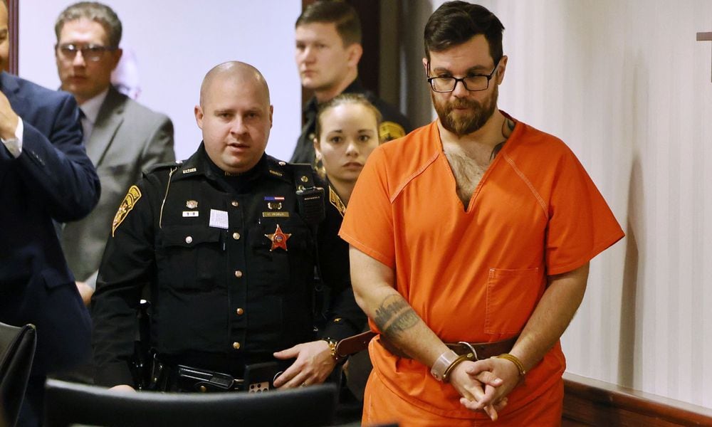 John Carter, charged with murder in the death case of Katelyn Markham, enters the Butler County Common Pleas Court on Monday, March 27, 2023. NICK GRAHAM/STAFF