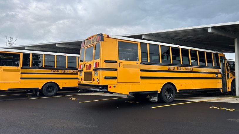 Buses in the Dayton Public Schools Transportation Center lot on James H. McGee Blvd. Eileen McClory/ staff