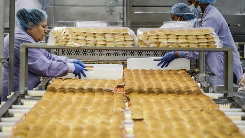 Works at the White Castle Vandalia plant box-up over a million hamburgers at day. JIM NOELKER/STAFF