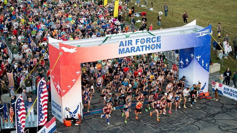 Full and half marathon runners pour through the starting line of the 27th annual Air Force Marathon on Sept. 16, 2023, near the National Museum of the U.S. Air Force, Wright-Patterson Air Force Base. More than 8,500 runners and 1,500 volunteers from all 50 states and 18 countries participated in the event. (U.S. Air Force photo by Jaima Fogg)