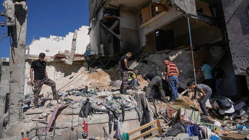 Palestinians inspect the destruction following an Israeli operation in Nur Shams refugee camp, near the West Bank town of Tulkarem, Sunday, June 30, 2024. Palestinian health officials said one person was killed and several wounded during an Israeli operation in the Nur Shams refugee camp in the northern West Bank. Israel frequently operates in the area, saying it is a stronghold of Palestinian militants. (AP Photo/Majdi Mohammed)