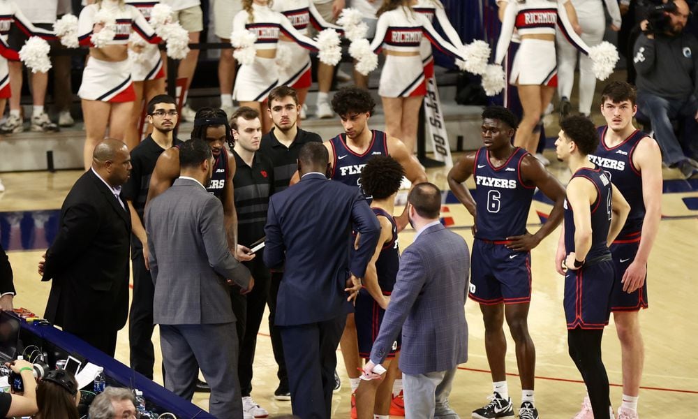 Dayton huddles during a game against Richmond on Saturday, Jan. 27, 2024, at the Robins Center in Richmond, Va. David Jablonski/Staff