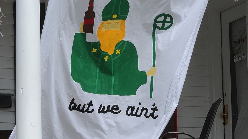 One of the many banners hanging up on the University of Dayton campus on Wednesday, March, 17, 2021, St. Patrick's Day. MARSHALL GORBY\STAFF