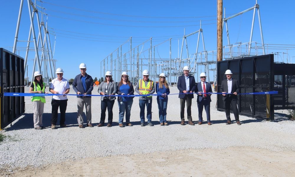 Preparing to cut the ribbon at the new AES Ohio Fayette substation in Jeffersonville. AES Ohio photo