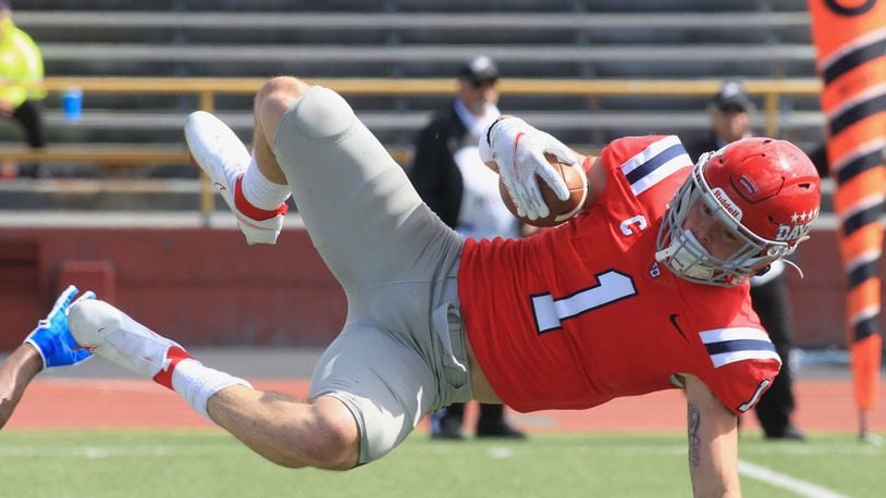 Dayton's Brandon Easterling is tackled after an interception against Presbyterian on Saturday, Sept. 25, 2021, at Welcome Stadium. The play was called because of defensive holding. David Jablonski/Staff