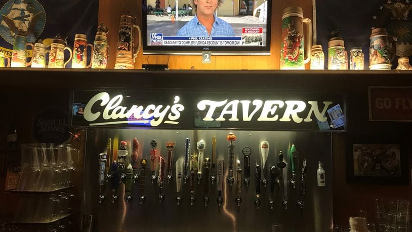 Clancy's Tavern in Dayton has nearly 30 beers on tap and tons of televisions to keep you and your relatives entertained. JIM INGRAM/CONTRIBUTED